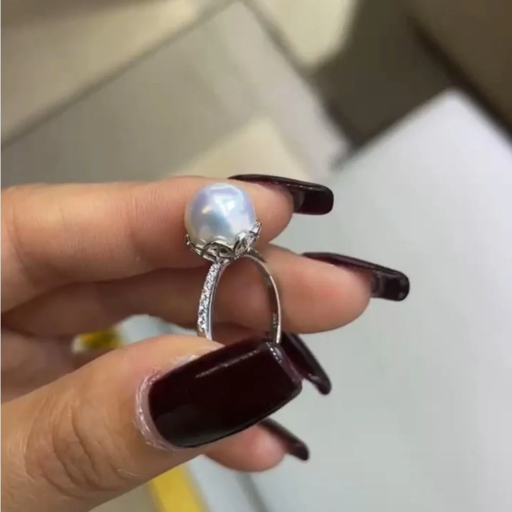 Watch video-Minimalist Silver and White Edison Pearl Ring with Elegant Design - Picture 1 of 2